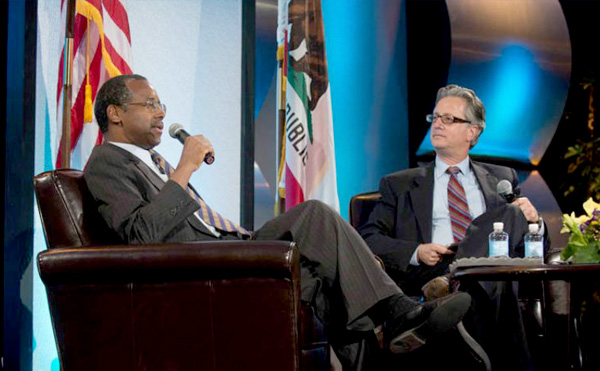 Brian Harnik moderates a panel with Former United States Secretary of Housing and Urban Development Dr. Ben Carson